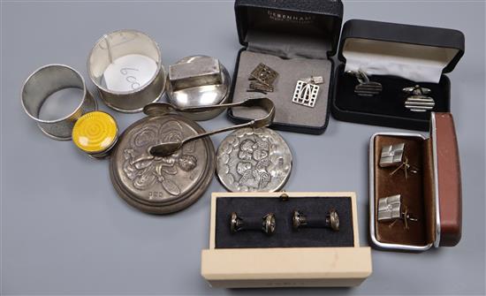 Small silver items including napkin rings, cufflinks, lids etc.